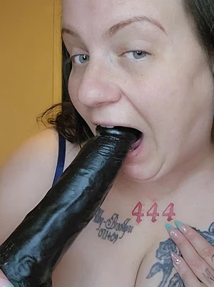 I love sucking off my big black dildo