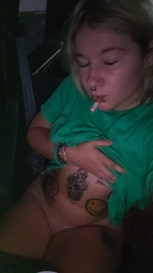 Smoking cigarettes in the car got so horny had to pull my pants to my ankles so my pussy is out